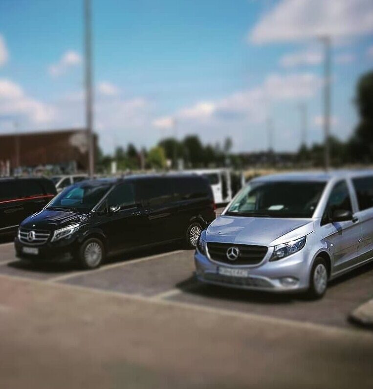 A lineup of Mercedes V-Class vehicles